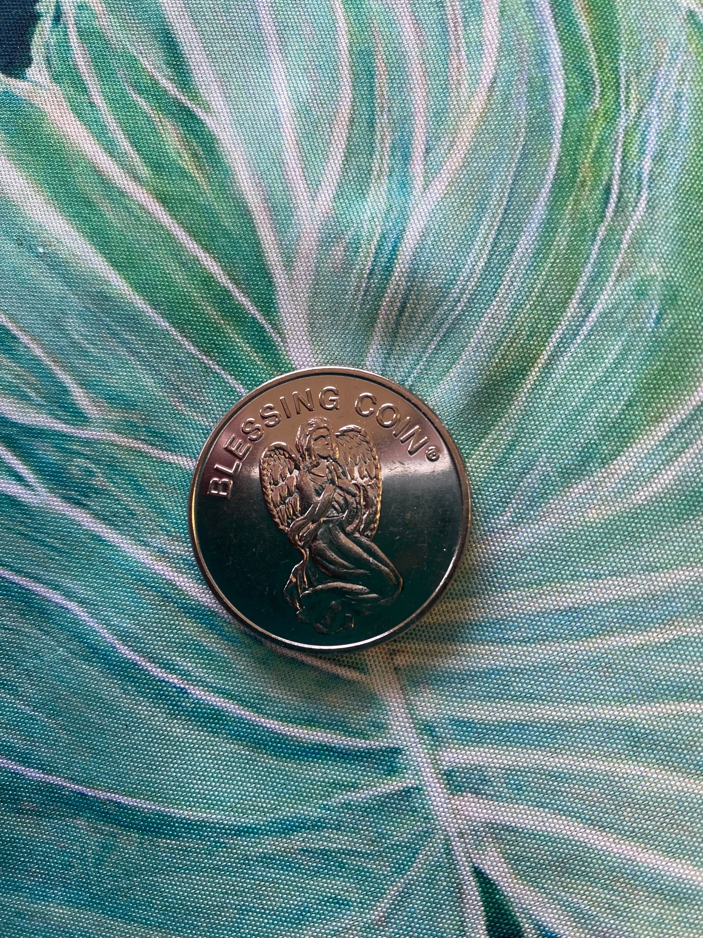 Angel blessing coin