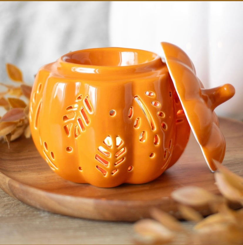 Orange pumpkin leaves oil burners